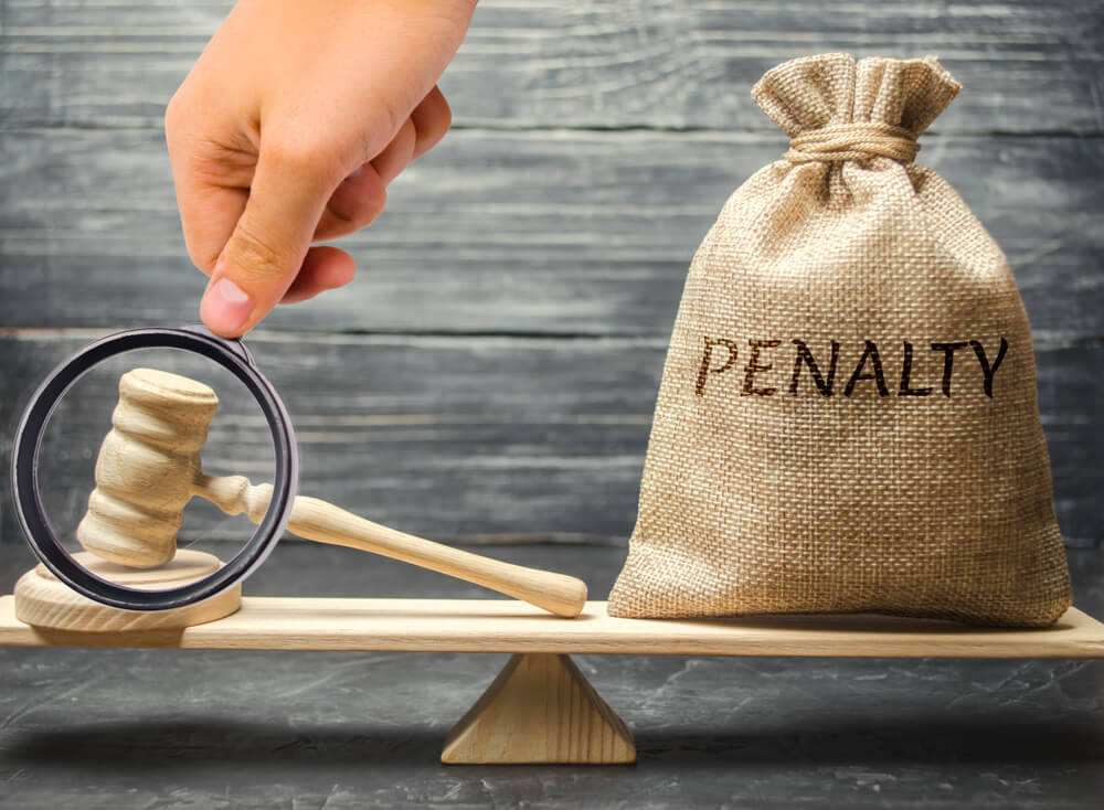 What are the penalties under Shop and Establishment Act